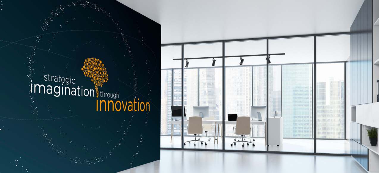 Modern office interior with inspirational wall graphic reading 'Strategic imagination through innovation' beside glass-walled workspaces and city skyline. – Created by i36design